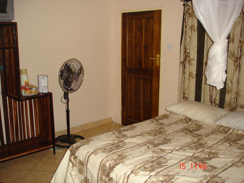 The Stone Guest House Livingstone Pokoj fotografie